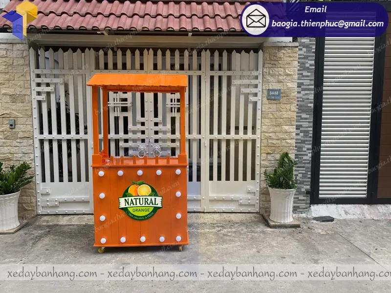 quầy gỗ bán nước cam