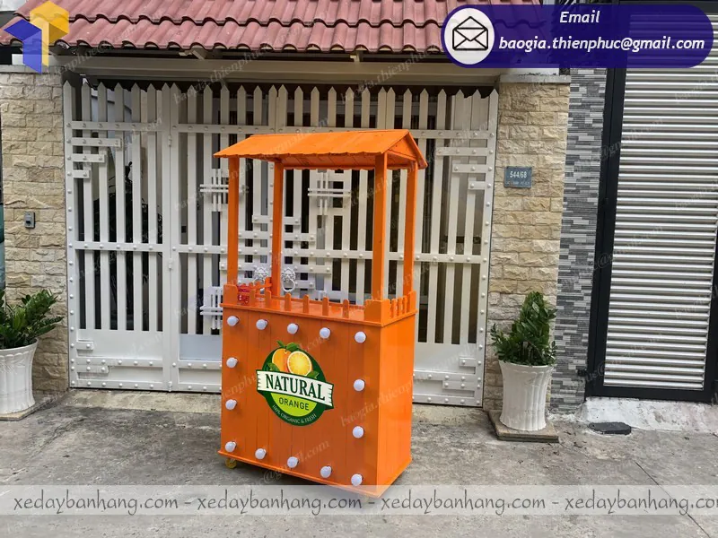xe gỗ bán nước cam